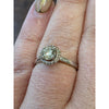 Warm Colored Natural .55ct Center Diamond (VS/O-P) With .05ct Accent Diamonds In 14kt White Gold Halo Mount
