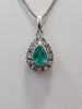 Natural .70ctw Emerald With .24ctw Natural Diamonds In Platinum