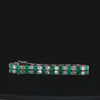 Natural Colombian Emerald and Princess Cut Diamond Tennis Bracelet set in 18K White Gold